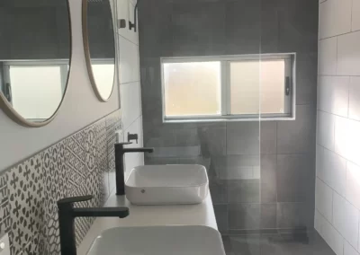 Gray lavatory Bathroom renovations Warwick Qld